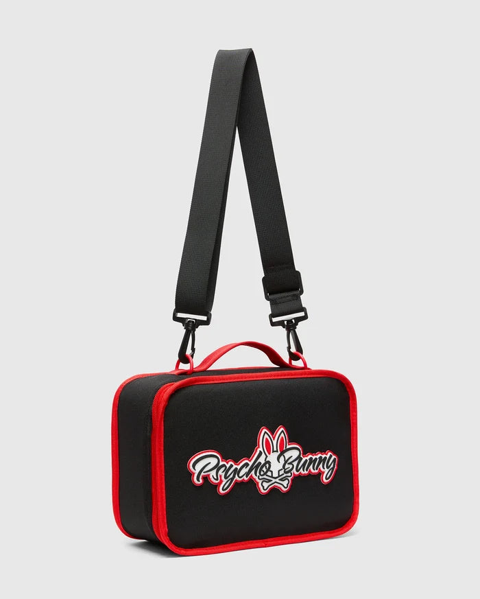 Black Kids Pal Lunch Box with vibrant red piping and handle, featuring a prominent white and red Psycho Bunny skull and text logo on the front, complete with a detachable shoulder strap.