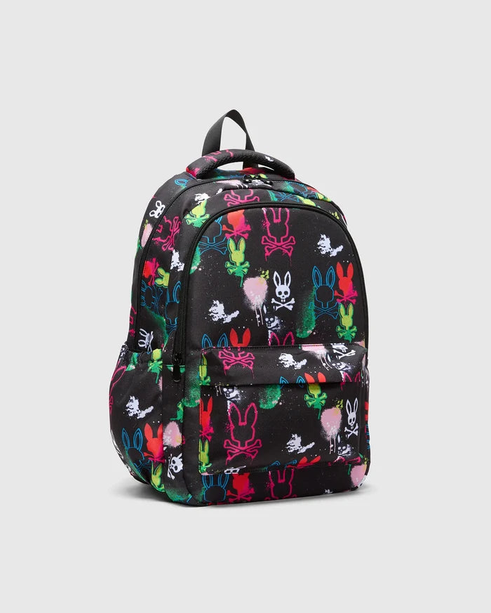 Kids Quintin Backpack, black durable fabric with a bold, all-over neon graffiti print featuring various Psycho Bunny skull and bunny outline logos, plus colorful paint splatters.