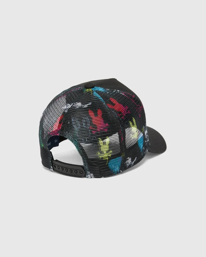 KIDS QUINTIN TRUCKER CAP. Black mesh trucker cap featuring a vibrant, repeating multi-color iconic Psycho Bunny skull print on the front panels, complete with a black adjustable snapback closure.