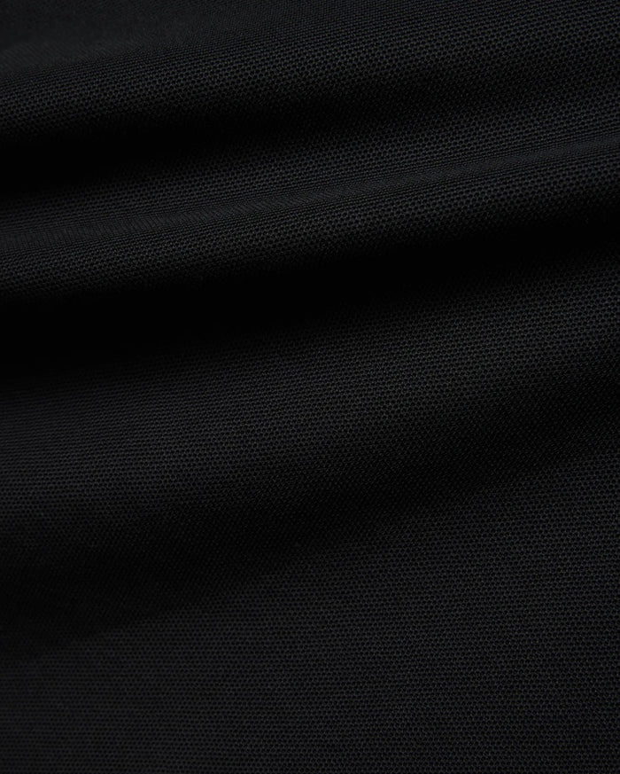 Black Kids Robin Pique Polo, a classic fit crafted from premium textured pique fabric, featuring the iconic embroidered Psycho Bunny skull logo on the left chest.