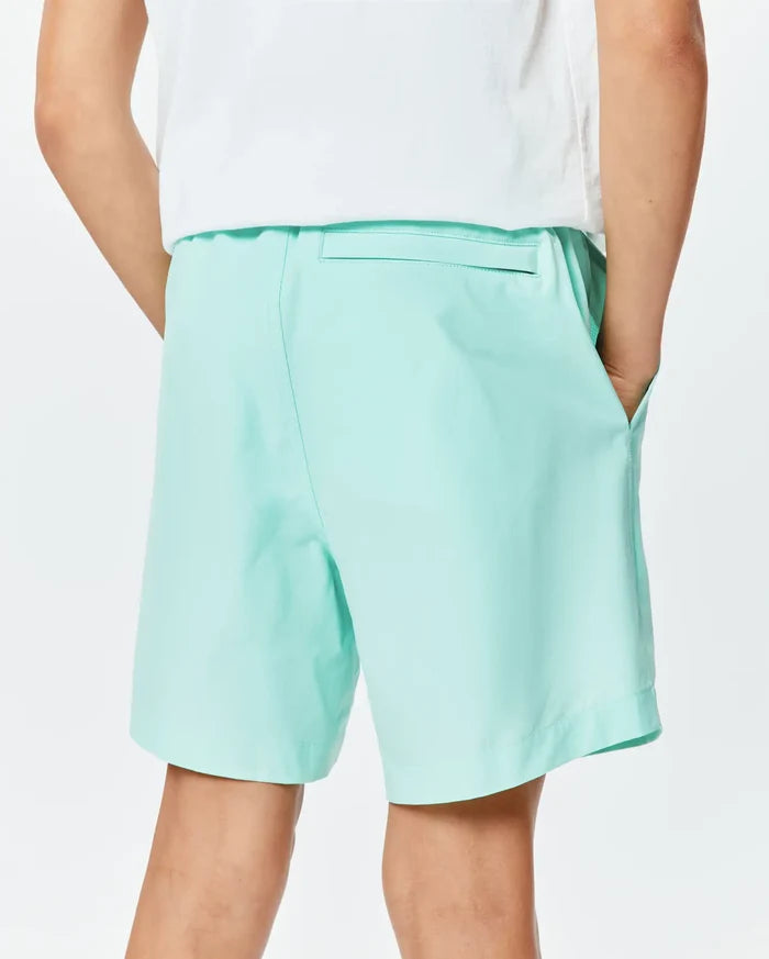 Kids Samos Hydrochromic Printed Swim Trunk in light green, featuring a relaxed fit, elastic waistband, side pockets, and a back pocket, made from smooth quick-dry fabric.