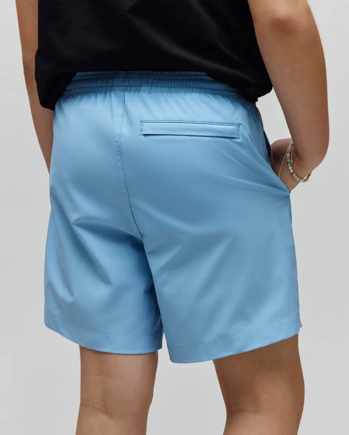 Kids Samos Hydrochromic Printed Swim Trunk in light blue, featuring a relaxed fit, elastic waistband, and a back welt pocket. Smooth, quick-dry fabric.