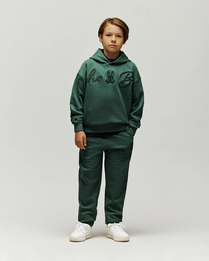 Forest green relaxed fit french terry hoodie with large tonal chenille Psycho Bunny script and skull logo on chest, paired with Kids Tate Chenille Sweatpant featuring a small tonal bunny skull logo.