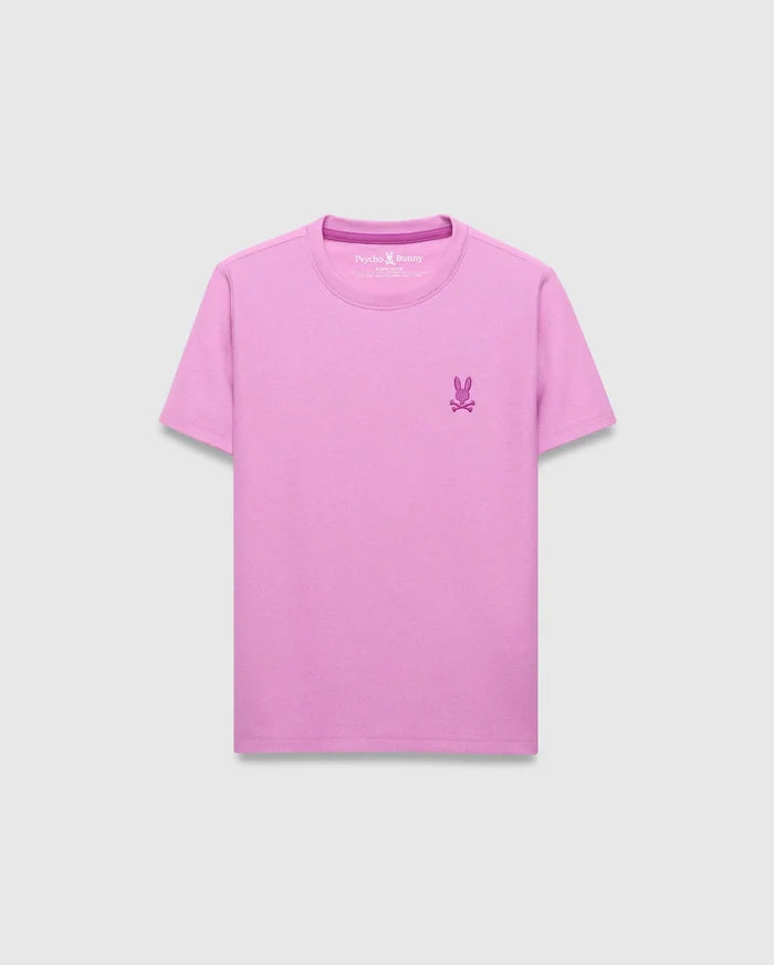 Kids Taylor Pique Tee in vibrant lavender pink, featuring a classic fit and pique texture. Small embroidered dark pink Psycho Bunny skull logo on the left chest, with a contrasting darker pink inner neck tape.