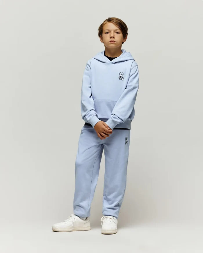 Light blue Kids Timothy 4k Bunny Jogger set, featuring a relaxed fit French terry hoodie with kangaroo pocket and matching joggers, both with small embroidered black Psycho Bunny skull logos.