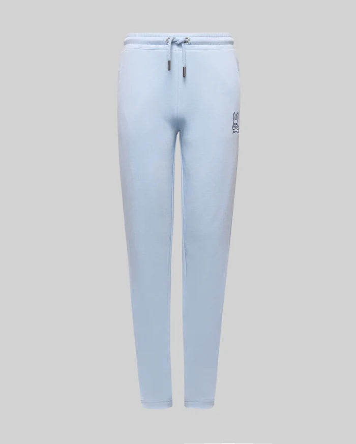 Kids Timothy 4K Bunny Jogger in light blue french terry, featuring a relaxed fit, drawstring waist with silver tips, and a small, embroidered dark blue Psycho Bunny skull logo on the left thigh.