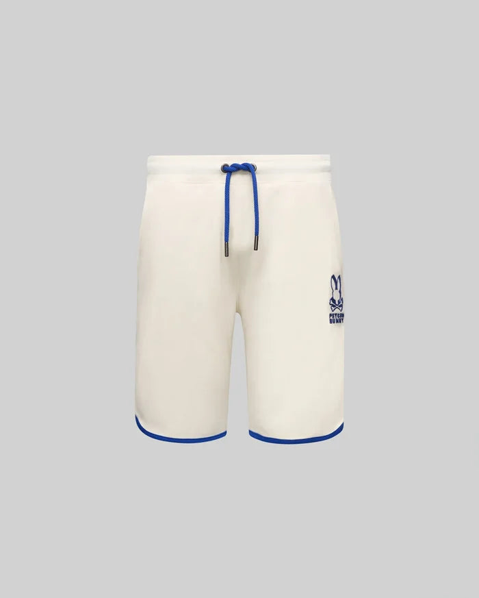 Kids Toby Short, cream French terry, relaxed fit, with royal blue drawstring, hem piping, and embroidered Psycho Bunny skull logo on the right thigh.