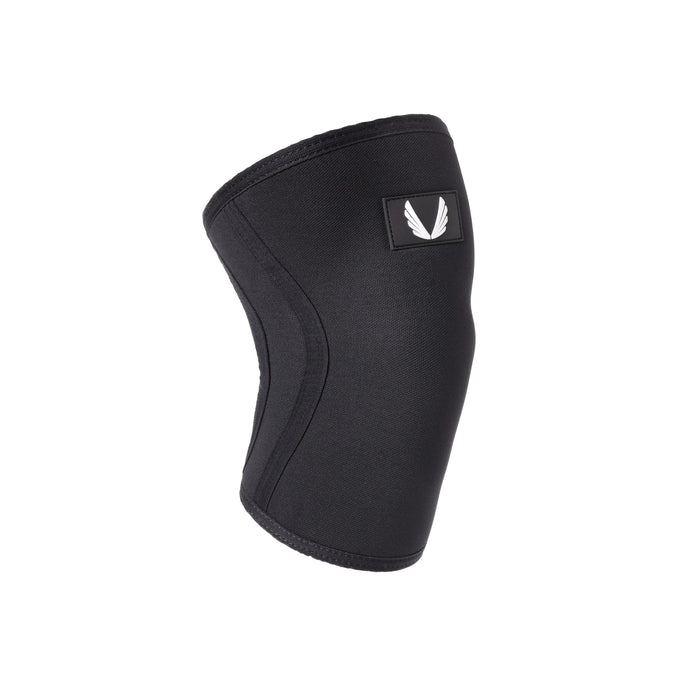 Black knee sleeve support brace displayed on angled stand against white background