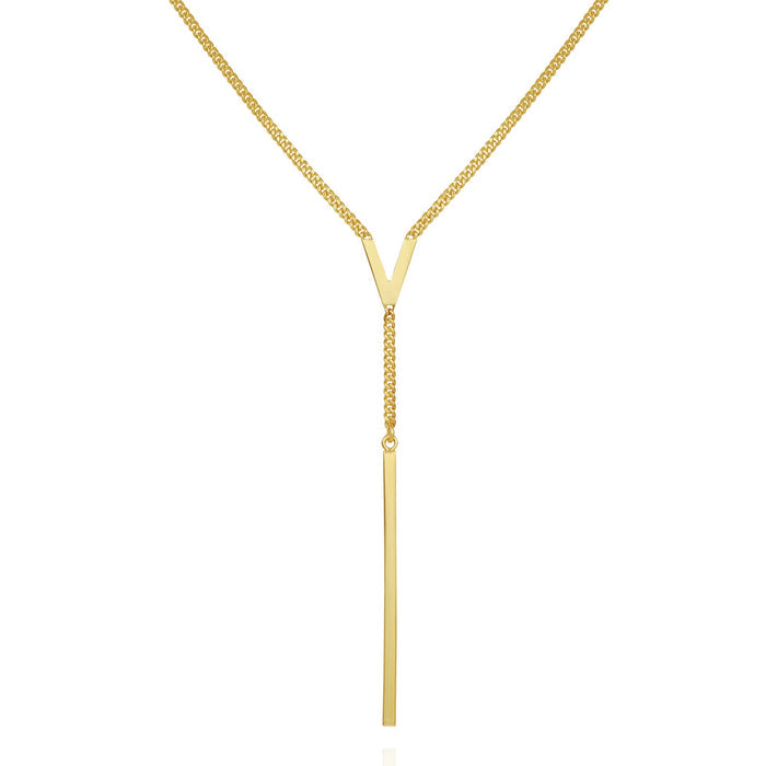 The Vince Camuto Lariat Y Necklace features a gold-tone design with a striking V-shaped centerpiece and a sleek, elongated bar pendant that creates an elegant Y silhouette, beautifully showcased against a white background.