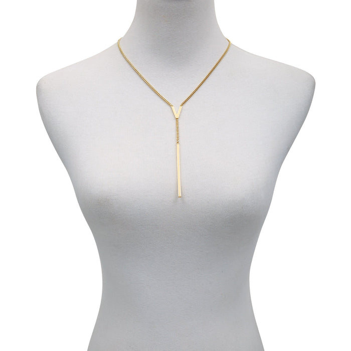 A Vince Camuto Lariat Y Necklace is elegantly displayed on a white mannequin bust, featuring a sleek gold-tone vertical bar pendant.