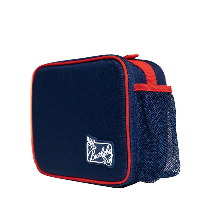 Burlebo lunchbox in patriotic colorblock shown from a front side angle. Navy body with red trim and mesh drink pocket, featuring Burlebo logo in white.