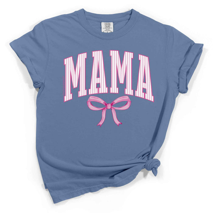 Blue t-shirt with 'MAMA' text and pink bow graphic on a white background