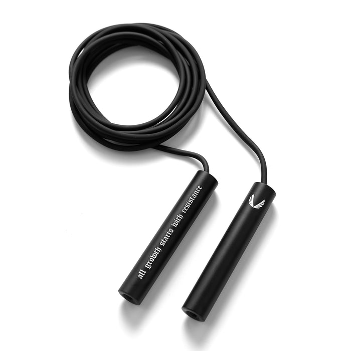flatlay Mantra Jump Rope in black with 'Growth' text, overhead view