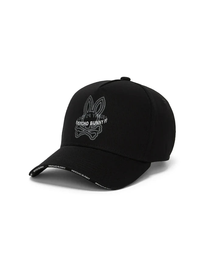 Mens Alex A-Frame Trucker Cap in black, featuring a large white and grey embroidered Psycho Bunny skull logo on the front and repeated white Psycho Bunny text on the brim.