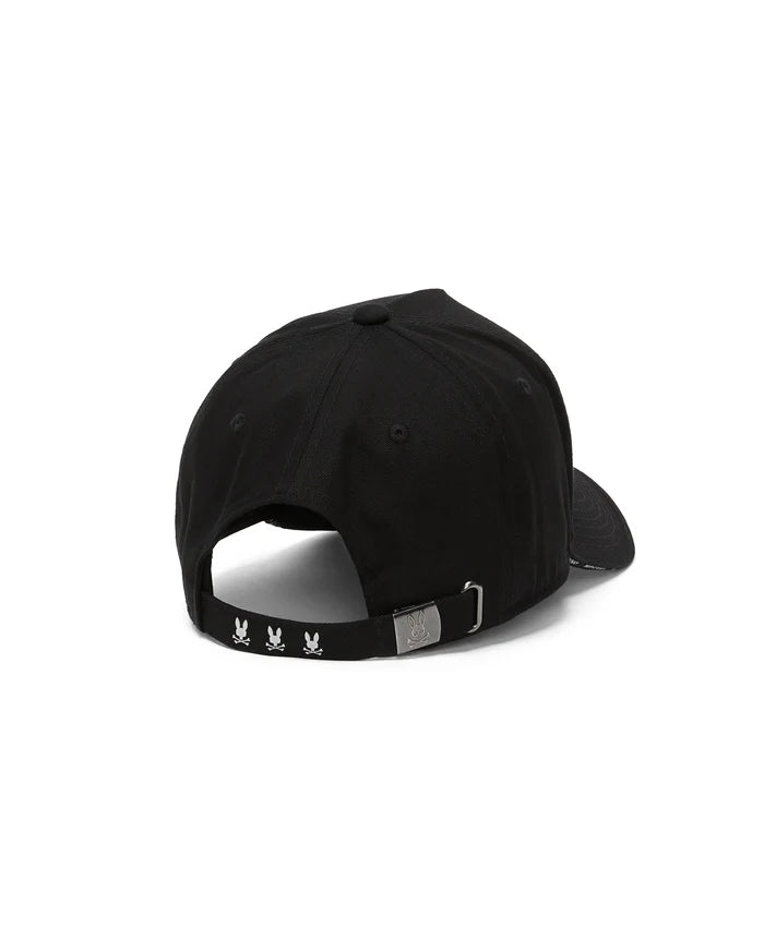 Black Mens Alex A-Frame Trucker Cap with three white embroidered Psycho Bunny skull logos on the adjustable back strap and an embossed bunny skull on the silver buckle.