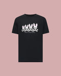 The Psycho Bunny MENS ARCHIVE GRADIANT BUNNY GRAPHIC TEE (MT0200029) is a black tee featuring four iconic Bunny skull and crossbones with pink ears above "BOLD SINCE 2005," set against a plain pink background.