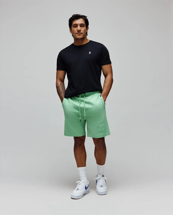 Black jersey t-shirt with small white embroidered Psycho Bunny logo on chest. Mens Barry Short, mint green french terry shorts featuring a large tonal embroidered bunny skull logo on the left thigh.