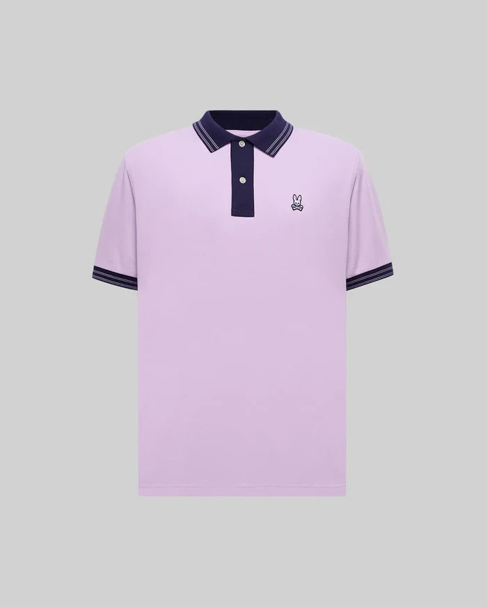 Mens Big And Tall Kenyon Lightweight Pique Polo in classic fit lavender pique, featuring a navy blue collar, placket, and tipped cuffs, with an embroidered Psycho Bunny skull logo on the left chest.