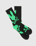 Mens Big Bunny Sport Sock, black knit with a bold, all-over neon green Psycho Bunny skull and crossbones logo pattern, featuring a comfortable crew length fit.