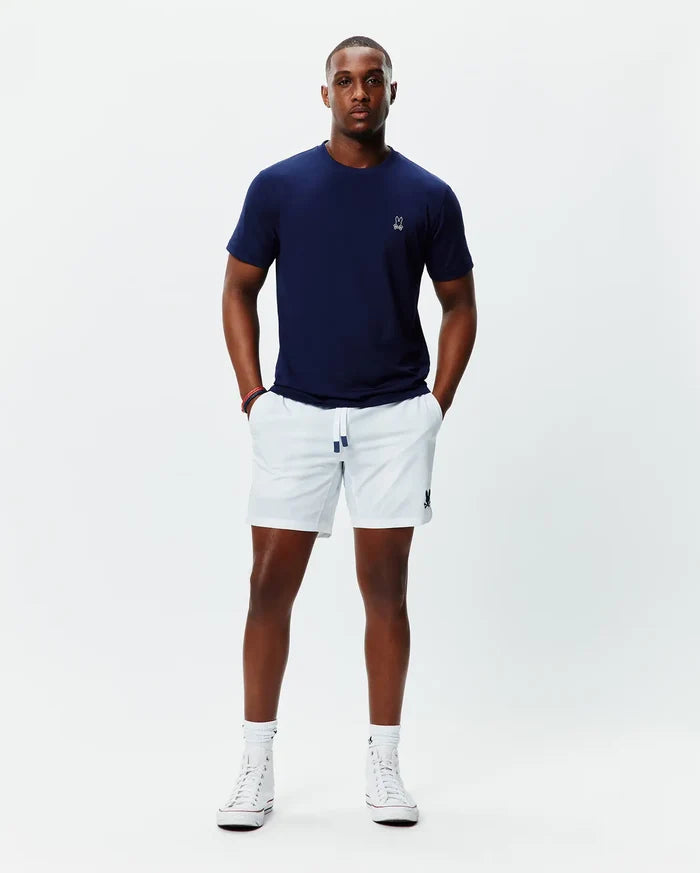 Navy jersey t-shirt with white embroidered Psycho Bunny skull on left chest, and white Mens Blaze Sport Short with navy-tipped drawstring and navy embroidered bunny skull on left leg.
