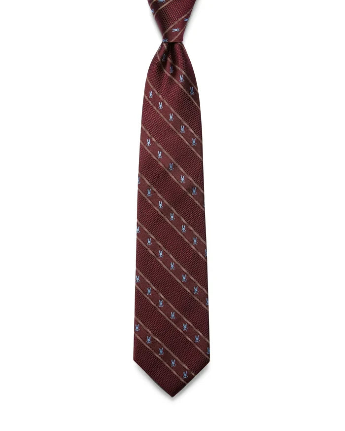 Mens Bunny Stripe Woven Tie in rich burgundy, featuring diagonal tan stripes and an all-over pattern of small, light blue Psycho Bunny skull logos with a refined woven texture.