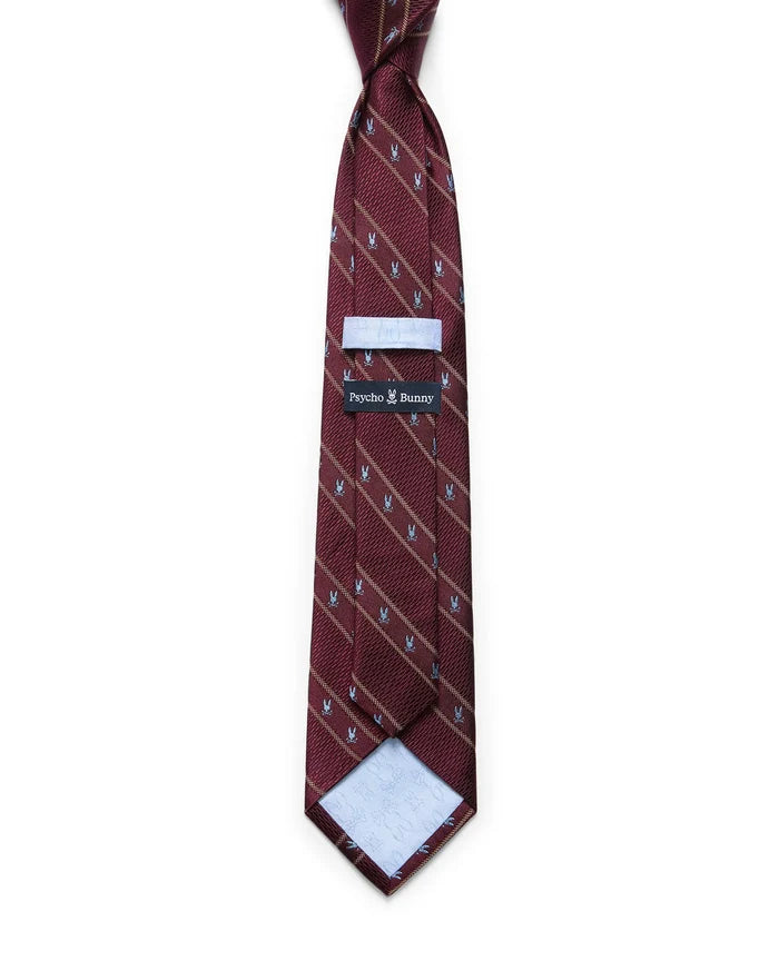 Mens Bunny Stripe Woven Tie in burgundy with diagonal gold stripes and a repeating light blue Psycho Bunny skull pattern. Woven texture, with a Psycho Bunny brand tag on the back.