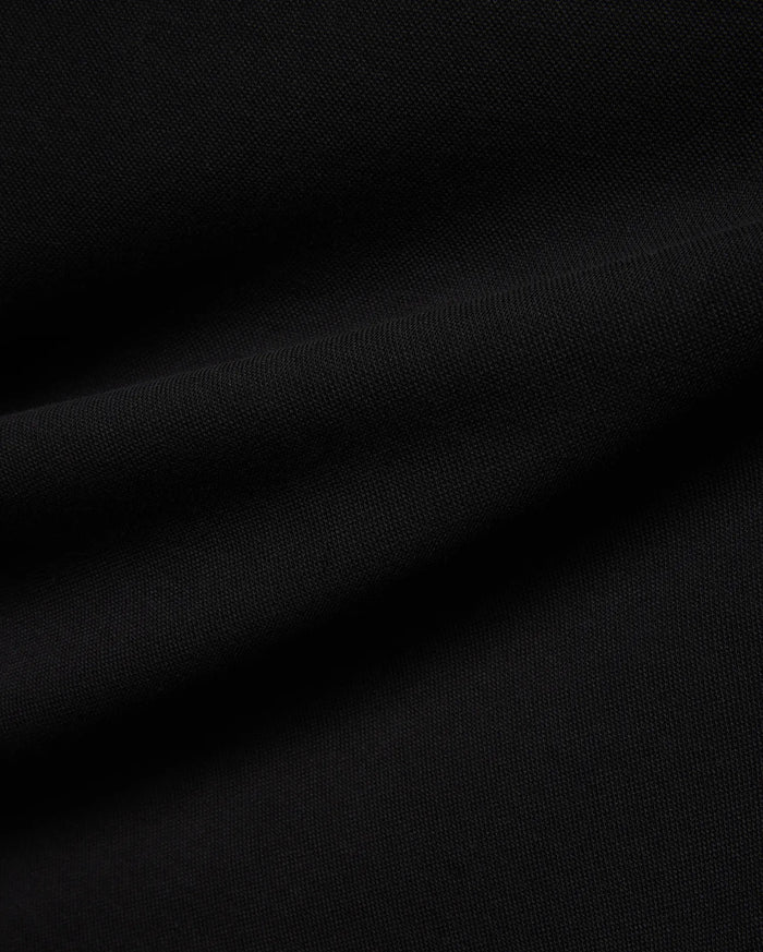 Psycho Bunny Mens Ceano Relaxed Fit Heavy Pique Polo in deep black, crafted from premium textured heavy pique fabric, typically featuring the iconic embroidered bunny skull logo on the chest.