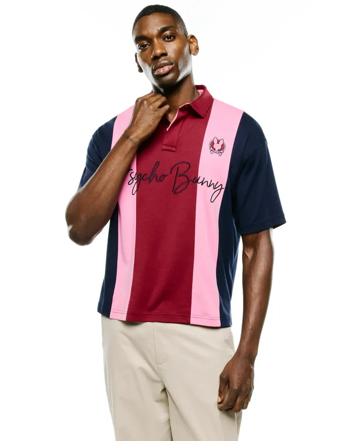 Mens Chad Relaxed Fit Striped Polo in burgundy, pink, and navy vertical stripes, featuring a small embroidered bunny skull logo and large Psycho Bunny script on the chest, made from smooth jersey.