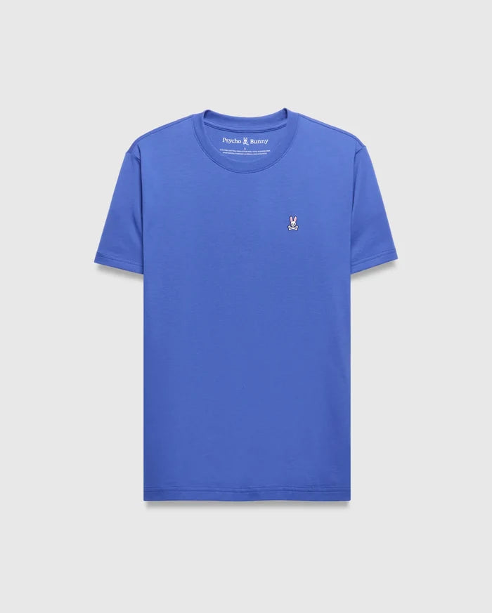 Mens Classic Crew Neck Tee in royal blue, featuring a classic fit and smooth jersey knit fabric. A small, embroidered Psycho Bunny skull logo in pink, white, and black is on the left chest.