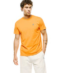 Mens Classic Crew Neck Tee in vibrant orange jersey knit, featuring a classic fit and a small, embroidered Psycho Bunny skull logo on the left chest.