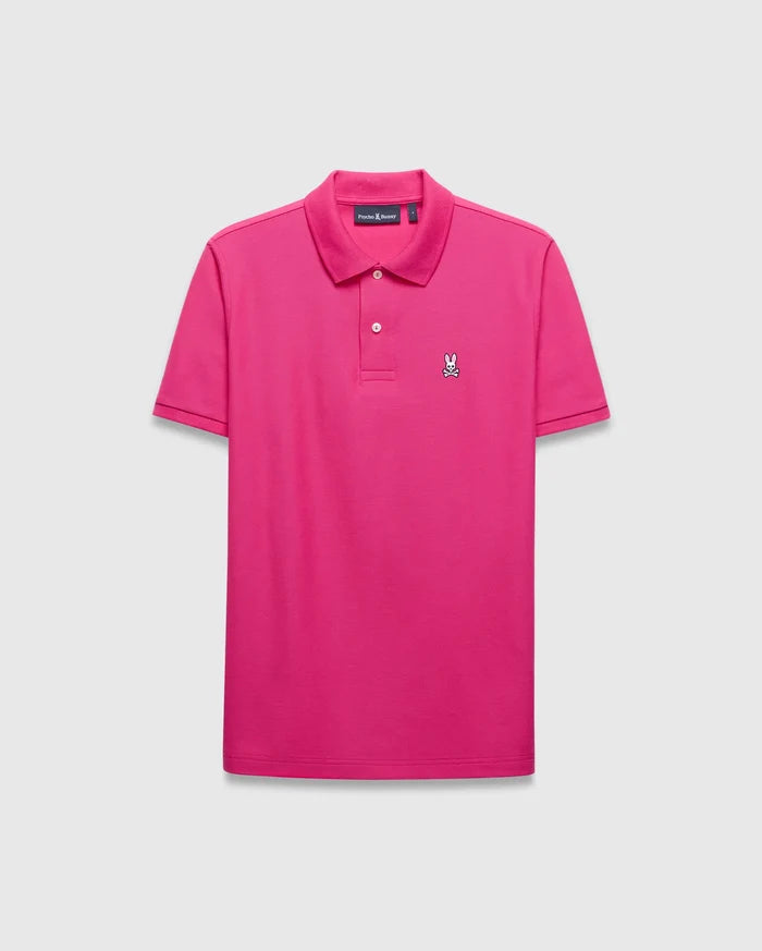 Mens Classic Pique Polo in bright pink, featuring a classic fit, pique knit texture, two-button placket, and a small, embroidered white, black, and red Psycho Bunny skull logo on the left chest.