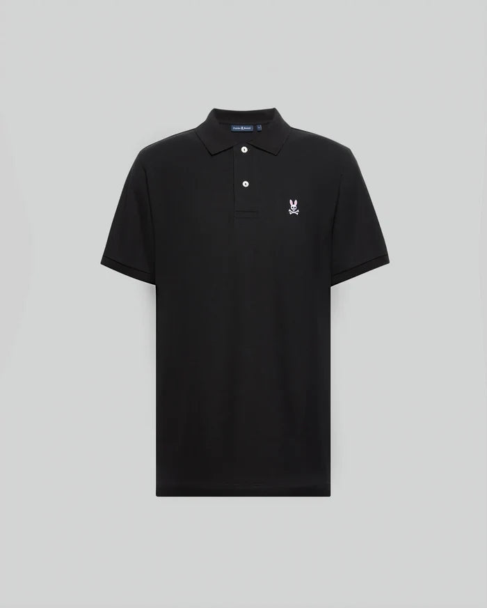 Mens Classic Pique Polo Shirt in black, featuring a classic fit, textured pique fabric, white buttons, and a small embroidered pink Psycho Bunny skull logo on the left chest.