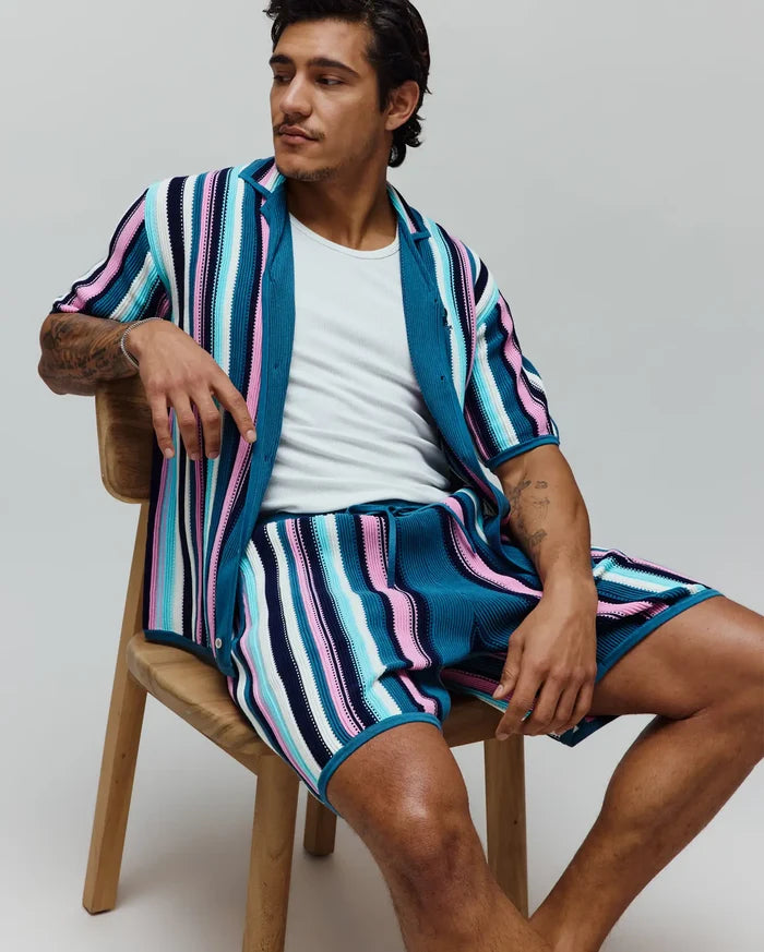 Mens Cliff Knit Short, a vibrant striped knit short in teal, pink, light blue, white, and navy, with a relaxed fit and textured fabric, part of a matching set.