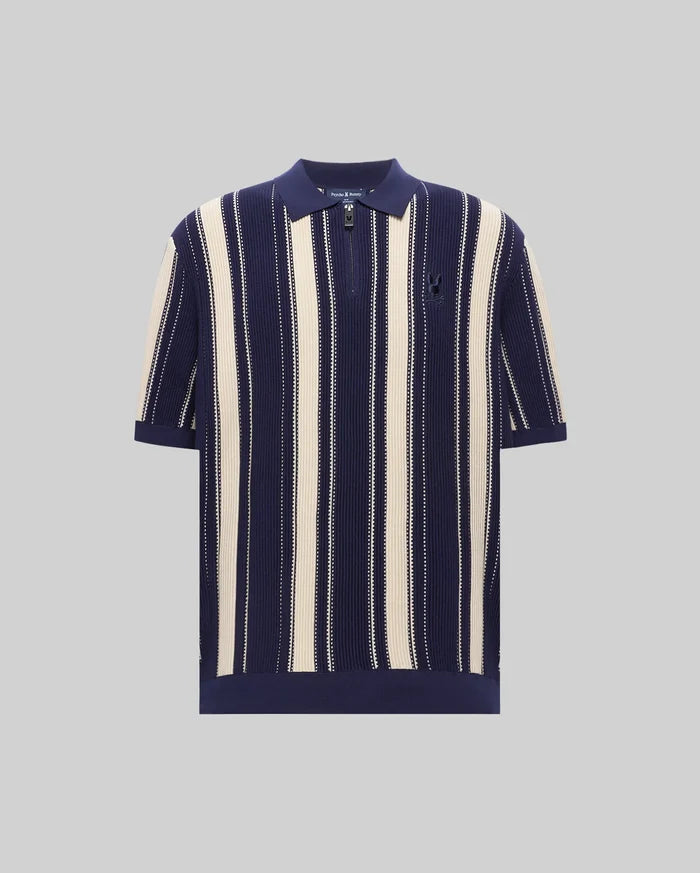 Mens Cliff Knit Zip Polo in navy and cream vertical stripes, featuring a relaxed fit, ribbed knit texture, quarter-zip placket, and a small embroidered Psycho Bunny skull logo on the left chest.
