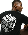 Men's Conan Pima Back Graphic Tee, a black classic fit Pima cotton jersey t-shirt featuring a large white 3D-effect Psycho Bunny text graphic and iconic bunny skull logo on the back.
