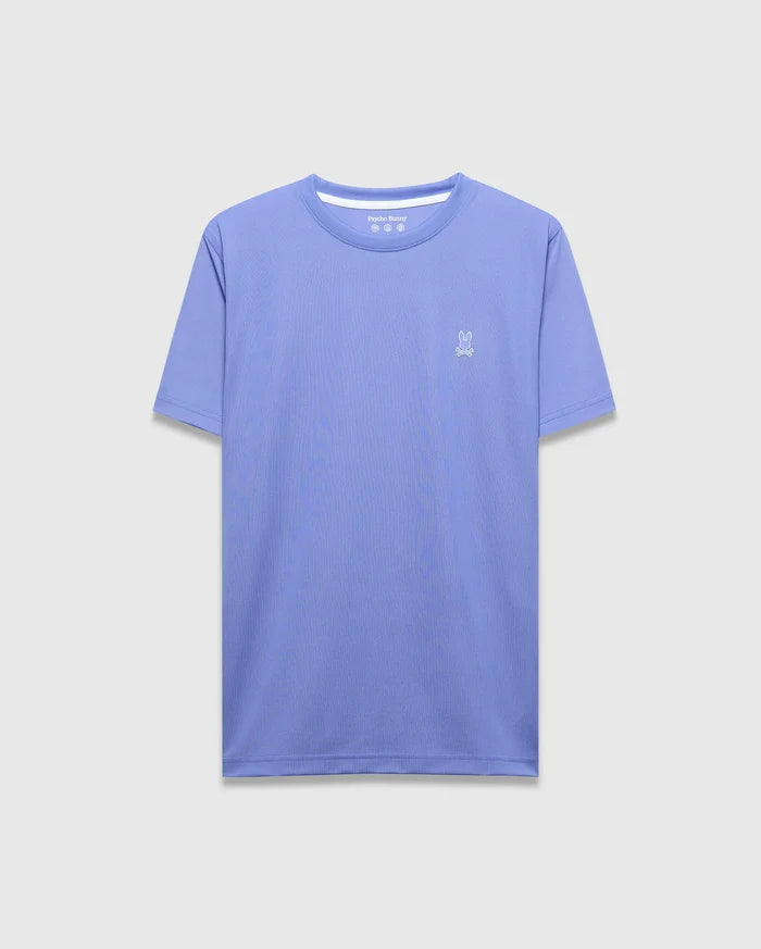 Mens Dash Bunny Sport Tee. Periwinkle classic fit performance t-shirt with a small white embroidered Psycho Bunny skull logo on the left chest and white inner collar detail.