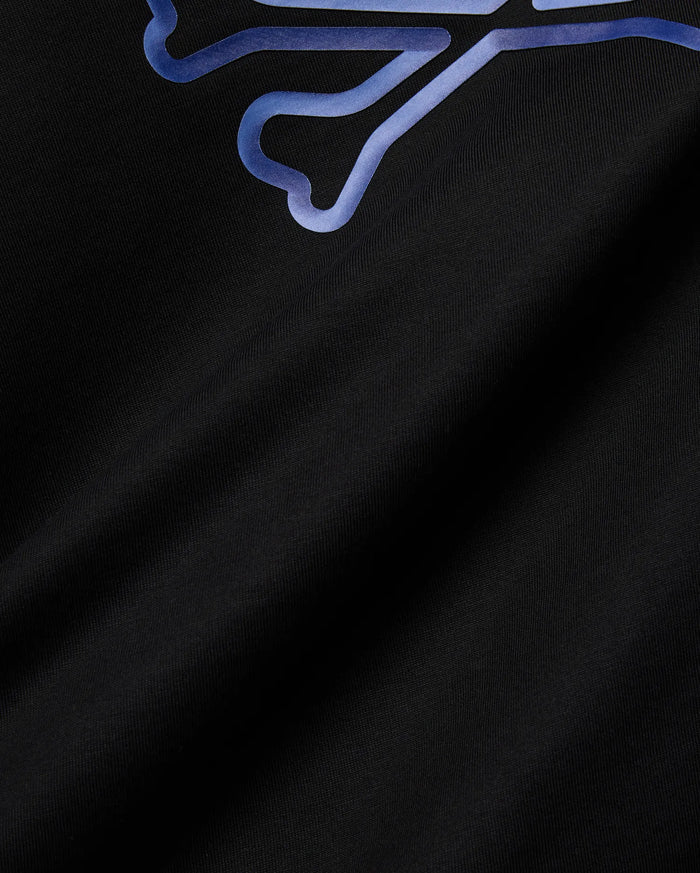 Mens Dayton Graphic Tee in black jersey knit, featuring a large, partial blue-purple gradient Psycho Bunny skull graphic print on the upper left, offering a classic fit.