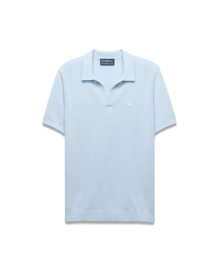 Mens Devon Bubble Stitch Knit Polo, light blue, featuring a classic fit and unique bubble stitch knit texture, with a small embroidered white Psycho Bunny skull logo on the left chest.