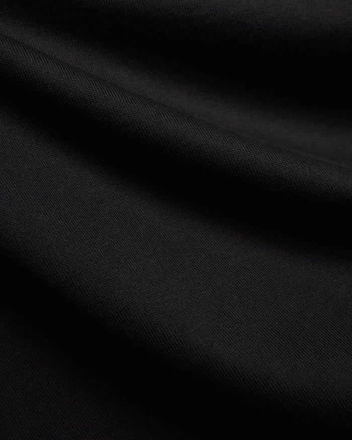 Black MENS DUNCAN RELAXED FIT TEE, a soft, premium jersey knit fabric with subtle folds, emphasizing its comfortable relaxed fit.