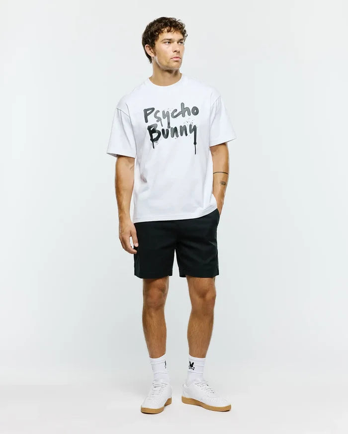 White Mens Duncan Wordmark Relaxed Fit Tee in jersey fabric, featuring a large black and grey graffiti-style Psycho Bunny wordmark with splatter and drip effects on the chest.