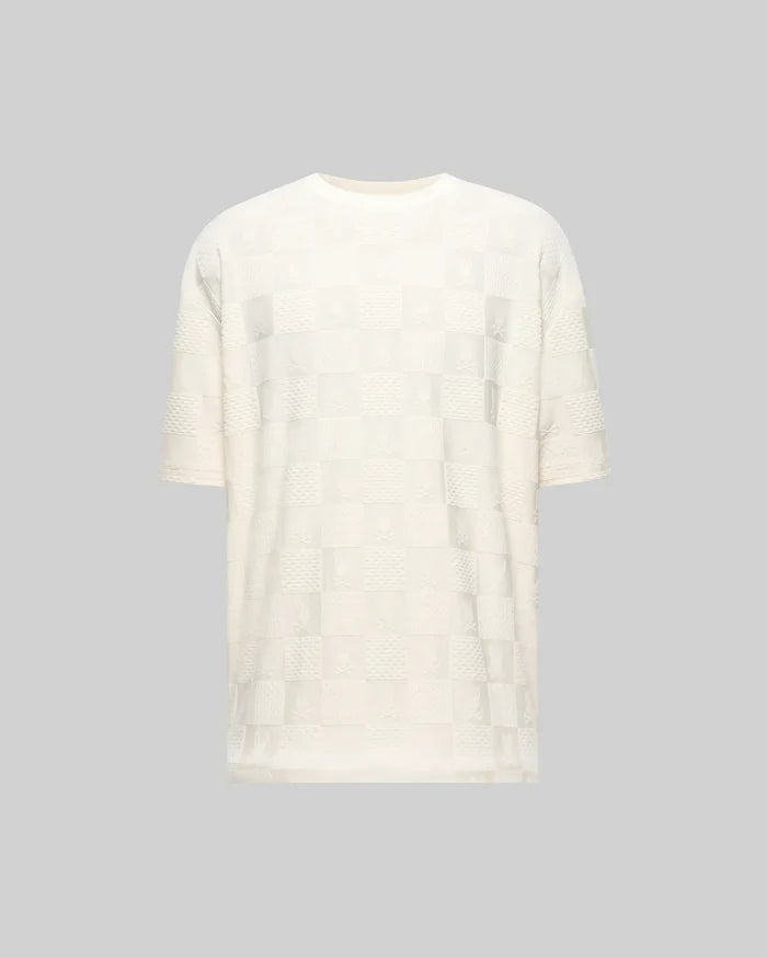 Mens Dustin Oversized Tee, cream jacquard knit with an all-over checkerboard pattern featuring embossed Psycho Bunny skull logos and textured squares.