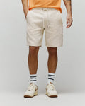 Cream relaxed fit textured knit Mens Dustin Sweatshort with an all-over embossed Psycho Bunny skull logo and checkered pattern, featuring a drawstring waist.