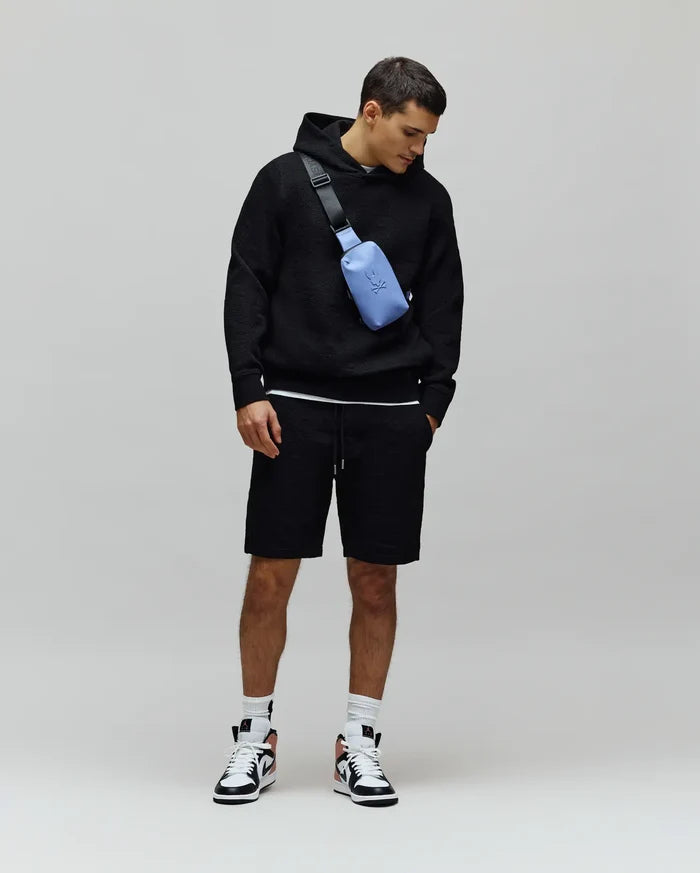 Black relaxed fit textured jacquard hoodie and matching Mens Dustin Sweatshort with drawstring waist, embodying refined streetwear.
