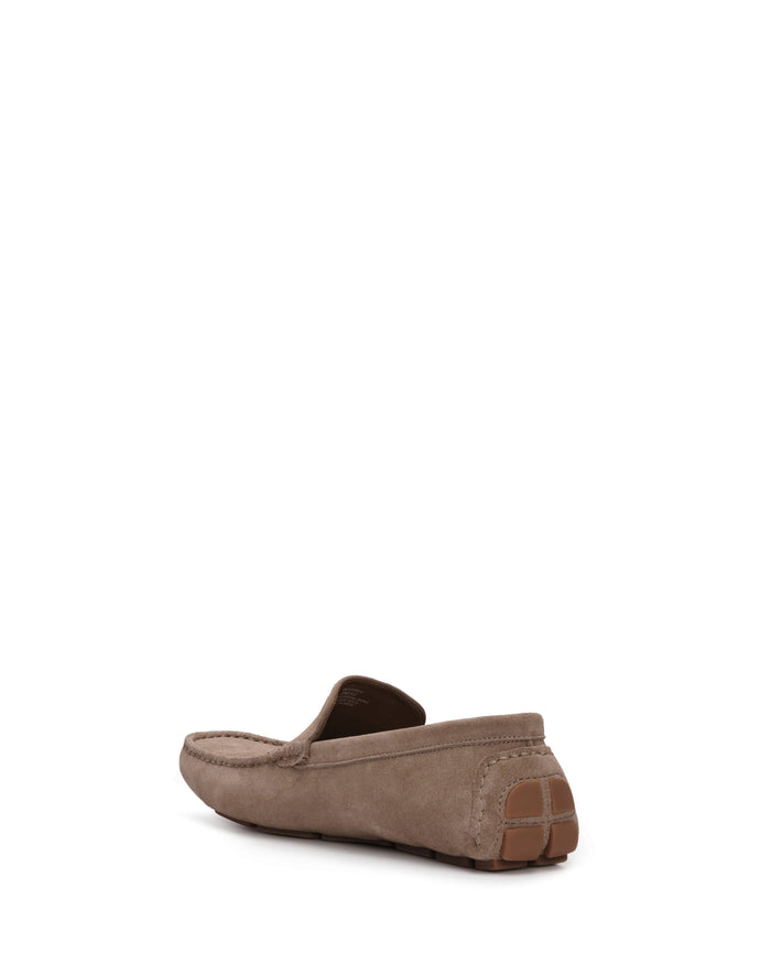 A men’s Eadric Casual Driving Shoe by Vince Camuto, crafted from tan suede, is shown from the back and side to showcase its intricate stitching and rubber heel grip. The comfortable footwear is set against a plain white background.