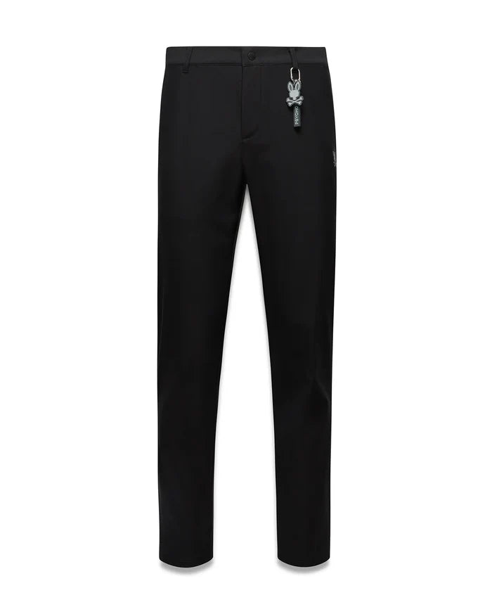 Black Mens Edward 10k Tapered Pant, slim fit, smooth fabric, featuring a subtle embroidered Psycho Bunny skull logo on the hip and a prominent grey Psycho Bunny keychain.