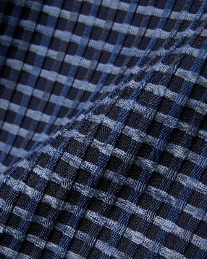 Mens Erik Raised Check Short featuring a textured, raised check pattern in varying shades of deep navy, medium blue, and light blue, creating a dynamic woven effect.