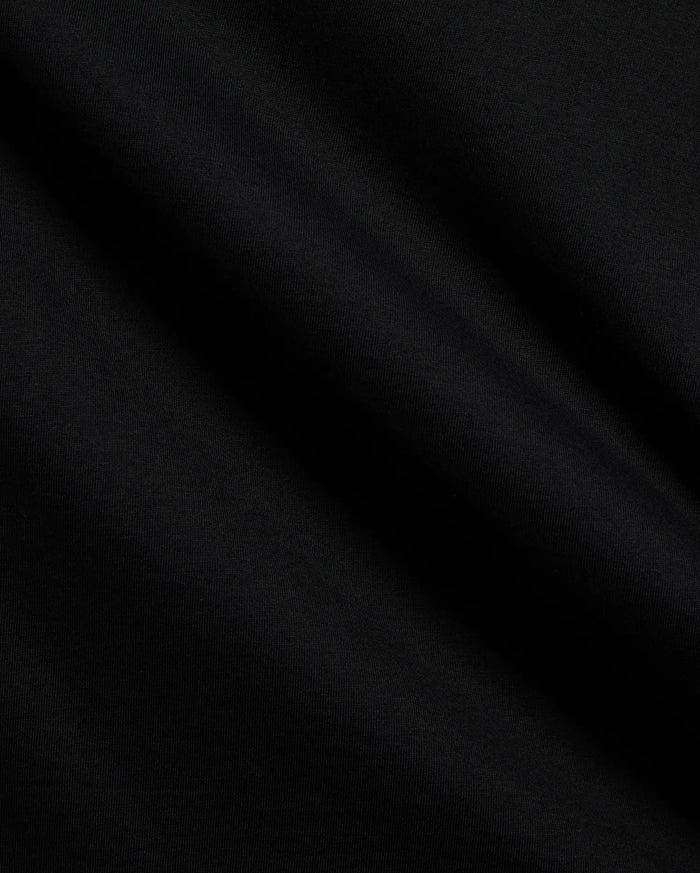Premium black Mens Frank Back Graphic Tee in soft jersey knit, showcasing a bold back graphic and the iconic Psycho Bunny skull logo.