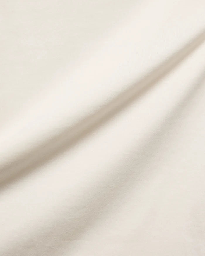 Cream Mens Frank Back Graphic Tee by Psycho Bunny, a premium streetwear item crafted from smooth, soft jersey knit fabric, featuring a back graphic.