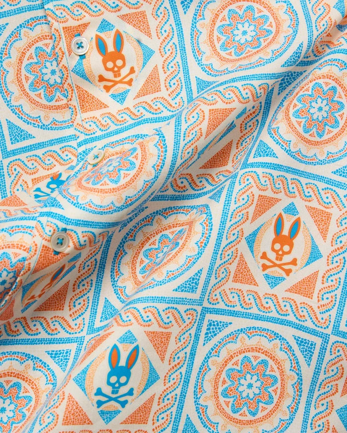 Mens Frank Tencel Shirt in cream with an all-over bright blue and orange mosaic tile pattern featuring repeated Psycho Bunny skull logos.