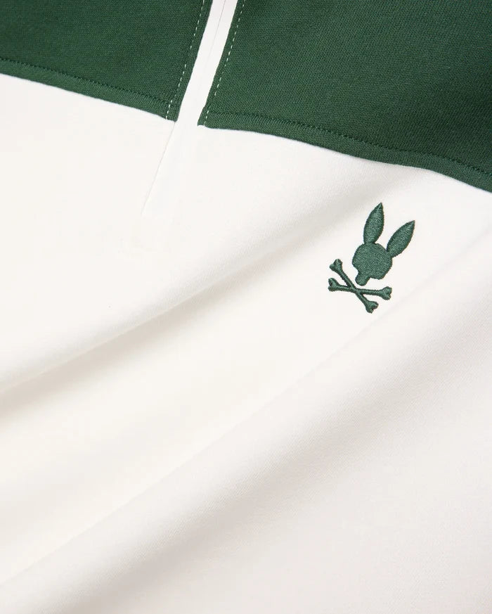 Mens Gabe French Terry 1/4 Zip, a white and dark green color-block design with a small, embroidered dark green Psycho Bunny skull logo on the chest. Soft French terry fabric.